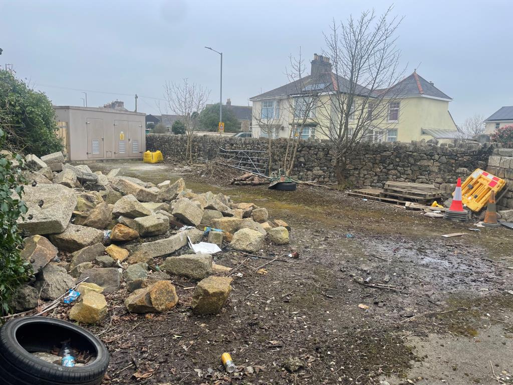 Lot: 21 - FREEHOLD LAND - Photograph of Lot with electricity sub-station in background